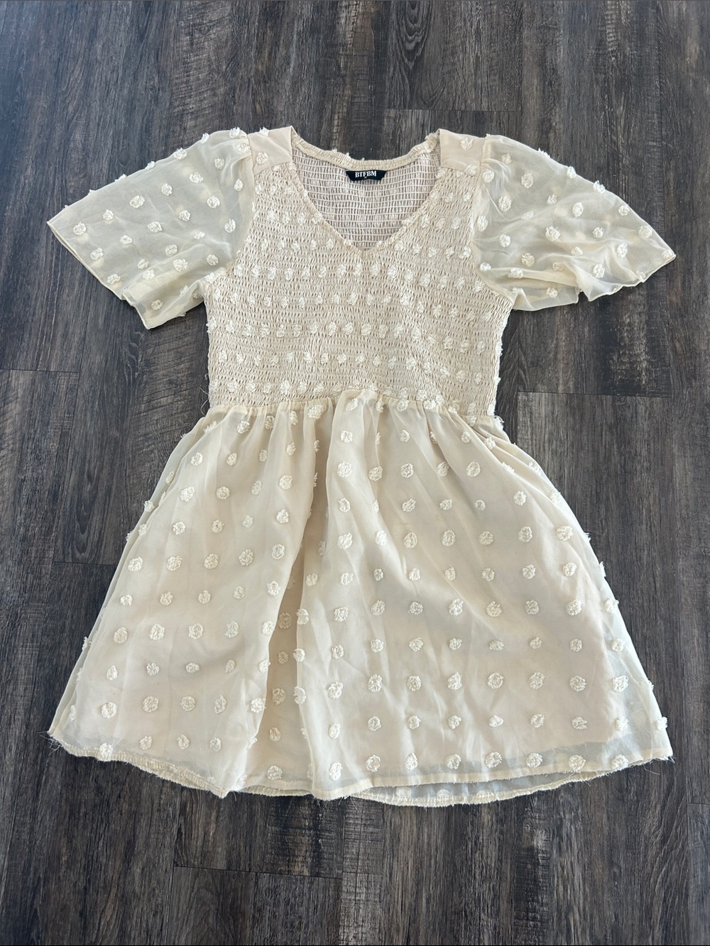 Beige Swiss Dot Smocked Mini Dress by BTFBM